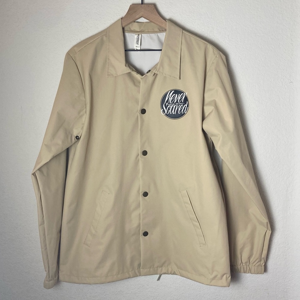 Independent Trading Company Never Scared Tan Water Resistance Coach Windbreaker